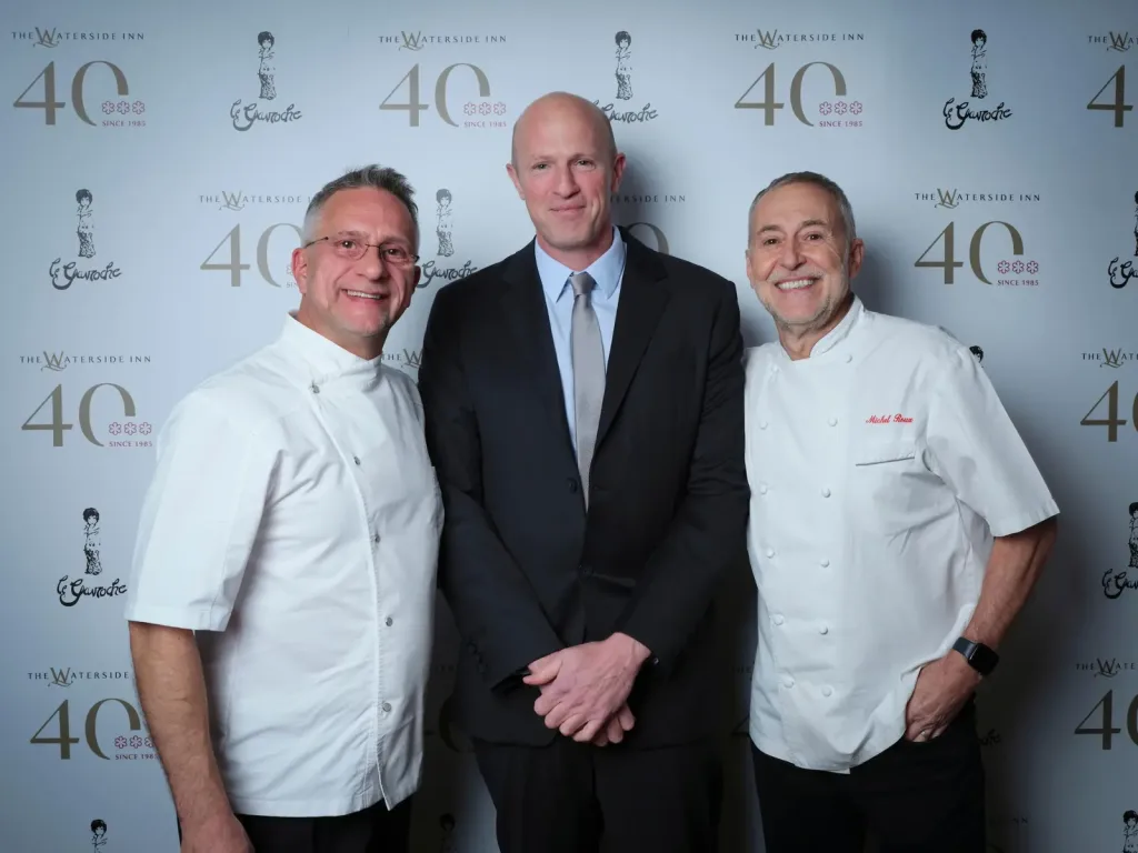 Zak Frost with chefs Alain Roux and Michel Roux Jr. at The Waterside Inn's 40th anniversary
